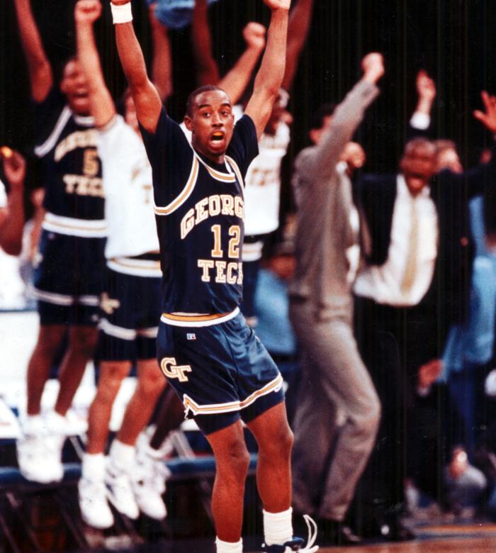 New Orleans, March 23, Georgia Tech guard Kenny Anderson (12) celebrates the shot that sent the game into overtime in NCAA Southeast Regional basketball action against Michigan State Friday night in New Orleans. Tech won the game 81-80. (Michael A. Schwarz/AJC staff) 1990